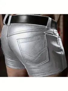 Close-up of silver metallic PU leather shorts showing back pocket texture and detail