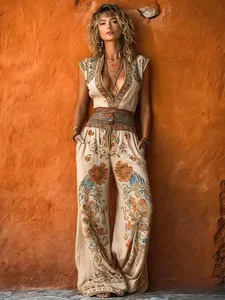 Fashionable bohemian floral print sleeveless V-neck jumpsuit with wide leg design