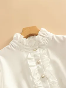 Elegant white women's blouse featuring a delicate ruffle collar and pearl button details