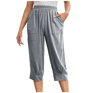 Detail view of women's grey cotton linen cropped pants with large front pockets
