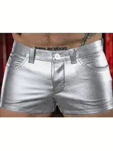 Close-up of men's metallic silver PU leather shorts with button fly and pockets