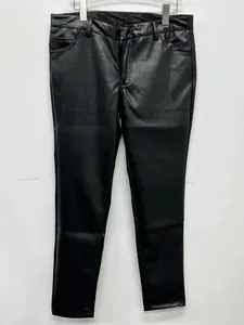 Close-up of black men's PU leather slim pants for outdoor cycling gear