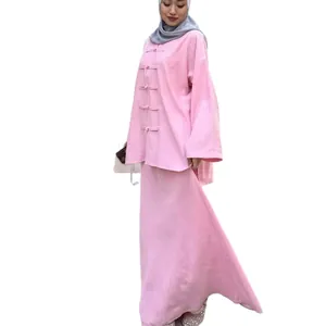 Elegante completo rosa in stile cinese finto lino con camicia asimmetrica e gonna.
