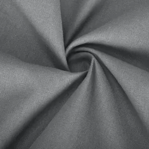 Close-up detail of soft grey cotton linen fabric showing natural woven texture