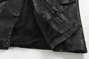 Close-up of black men's leather jacket with soft warm fleece lining and zipper detail