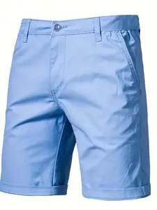Close-up detail of light blue men's cotton casual shorts with waist button and side pockets