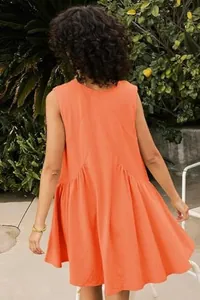 Back view of a vibrant orange sleeveless mini dress with pleated flared skirt