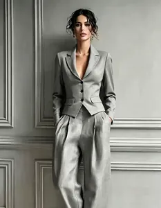 Full view of elegant gray single-breasted blazer and wide-leg trousers suit set for women
