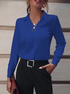 Elegante blusa de manga larga para mujer en azul real con cuello en V y cuello clásico