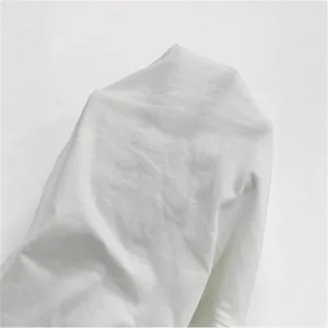 Detailed macro texture of white cotton linen tencel fabric for wide leg casual summer pants