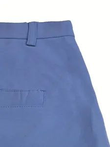 Close-up detail of the pocket and waistband stitching on blue men's outdoor casual shorts