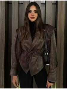 Elegant vintage brown belted leather jacket with oversized shoulders for stylish women