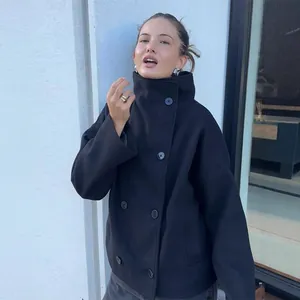 Side view of a black stand collar double-breasted short coat for women