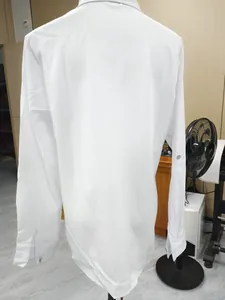 Back view of a minimalist white long sleeve lapel shirt with metal button detailing