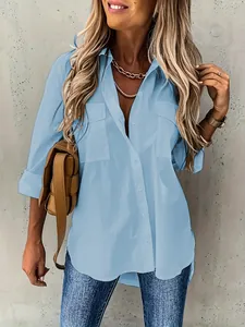Casual women's light blue loose long-sleeve lapel shirt with pockets and buttons