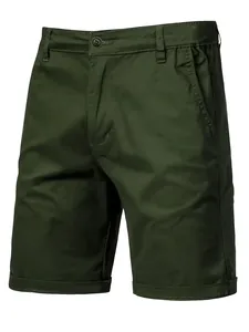 Dark green slim fit cotton shorts for men featuring side pockets and button closure