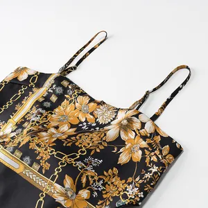Close-up of vintage floral and chain print satin camisole top for women