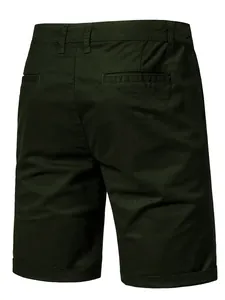 Back view detail of dark green casual shorts showing welt pockets and belt loops