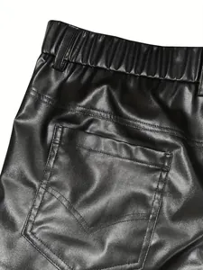 Close-up detail of black PU leather shorts showing back pocket and elastic waist
