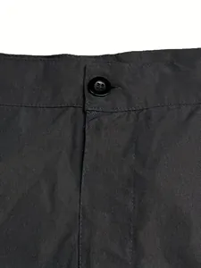 Detail view of black outdoor casual cotton shorts with button closure and waistband