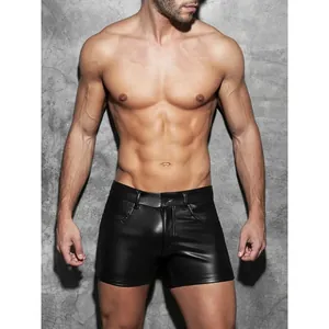 Men's sexy black PU leather shorts featuring a slim fit design and industrial background