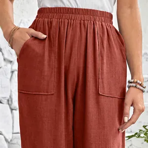 Detailed view of elastic waist cotton linen pants with large pockets and textured fabric