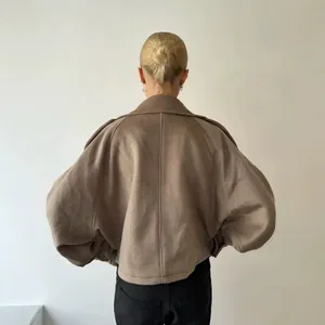 Oversized taupe wool jacket for women featuring a stand collar and back seam detail