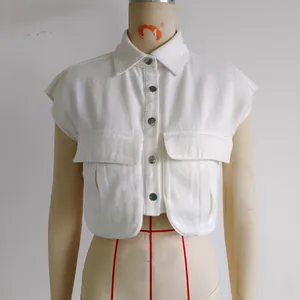 White denim vest with lapel collar and large front flap pockets for women