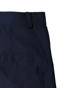 Detailed macro view of navy blue cotton outdoor casual shorts featuring a classic welt pocket