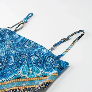 Detail shot of blue vintage paisley print satin camisole with thin adjustable straps