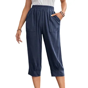 Women's loose navy blue cotton linen cropped pants with elastic waist and large pockets