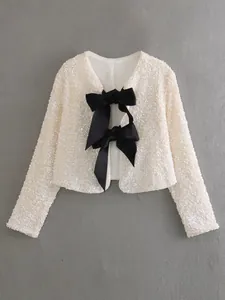 Elegant ivory sequined short jacket with decorative black bow ties for party wear