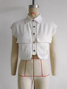 White cropped sleeveless denim vest with Polo collar and utility pockets displayed on a mannequin
