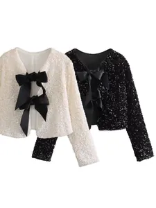 Sparkly sequin cropped jackets with elegant front bow ties in black and white colors