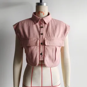 Detailed front view of a pink sleeveless polo shirt featuring oversized chest pockets
