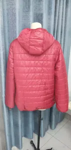 Detailed back view of a lightweight red hooded puffer jacket for women winter fashion