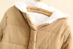Detail view of khaki hooded puffer jacket with soft white fleece lining and zipper closure