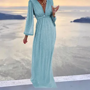Elegant light blue long sleeve maxi dress featuring a deep V-neck and shimmering sequin detail