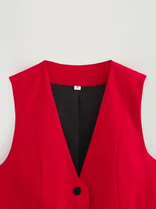 Close-up detail of a vibrant red V-neck slim-fit waistcoat with a black inner lining.