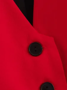 Detail view showing red twill fabric texture and black buttons on a women's vest jacket