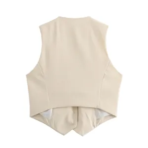 Back view of a professional minimalist cream-colored slim-fit women's waistcoat vest