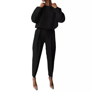Elegant women's solid black two-piece casual set featuring a long sleeve top and trousers