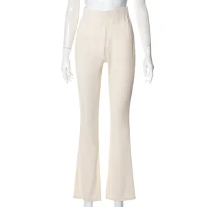 Elegant cream high-waisted ribbed flare pants for a slim fit and sophisticated look