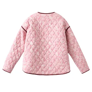 Back view of pink quilted winter jacket featuring white paisley print and burgundy trim details