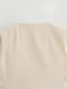 Detailed close-up of the smooth back neckline on this elegant beige slim vest jacket