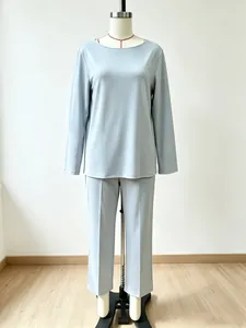 Professional mannequin display of a light blue long-sleeve top and trousers lounge set