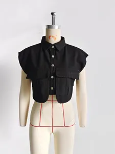 Solid black sleeveless faux denim cropped vest with large pockets and a Polo collar design