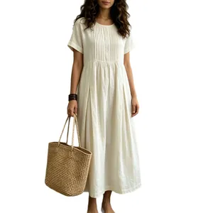 Elegant white cotton linen short sleeve midi dress with pleated details for summer