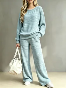 Close-up of light blue ribbed knit texture on stylish two-piece loungewear set
