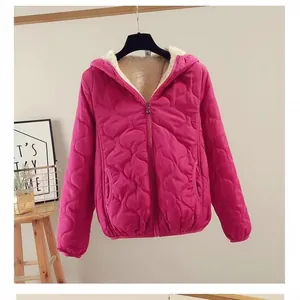 Stylish magenta fleece-lined hooded quilted jacket for women featuring a warm zip-up design